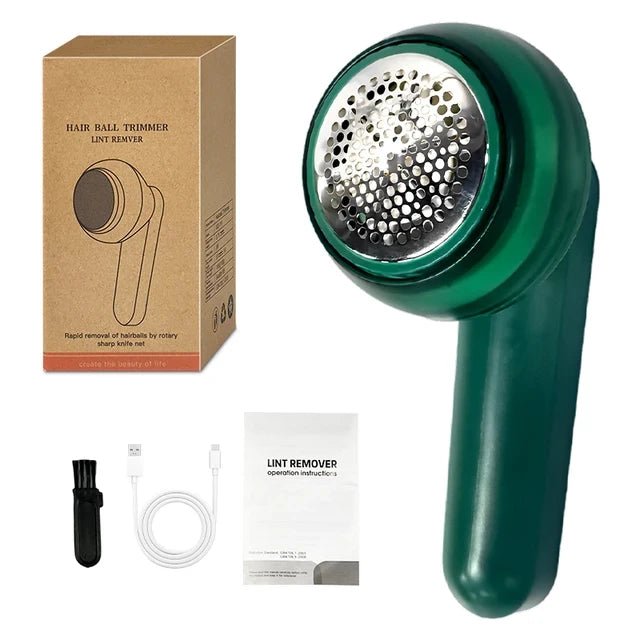 Rase bouloches. Gros plan, zoom sur fond blanc et tous les accessoires fournis avec autour. Brosse, câble USB-C, carton d'emballage, notice et lames de rechanges