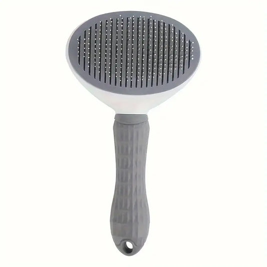 Brosse de toilettage grise en gros plan