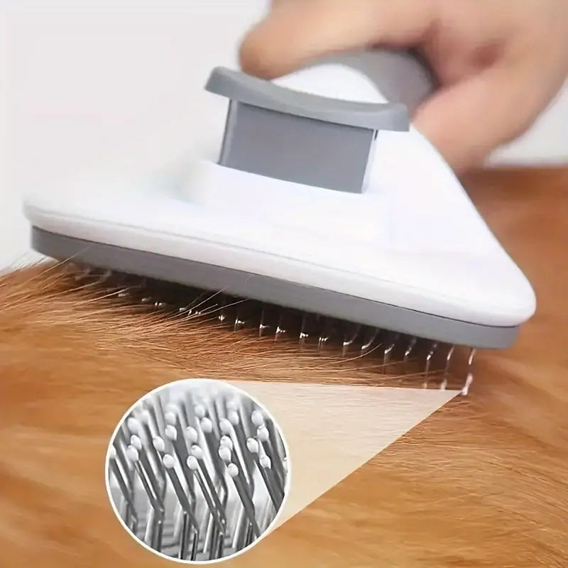 Brosse de toilettage. Gros plans sur le bout des dents arrondi avec un bout de caoutchouc pour protéger l'épiderme de l'animal