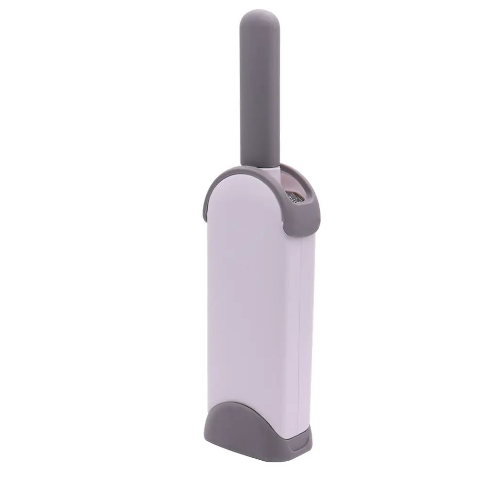 Brosse Ramasse Poils Electrostatique pour Textiles dans son socle auto nettoyant