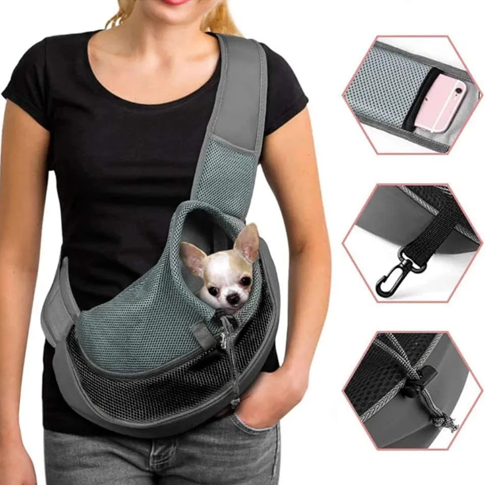 Sac de transport pour animaux en bandoulière. Elle a une pochette pour le smartphone, un mousqueton pour accrocher au collier de l'animal et une cordelette de règlage
